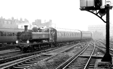 Pannier 4692 brings empty stock into Waterloo