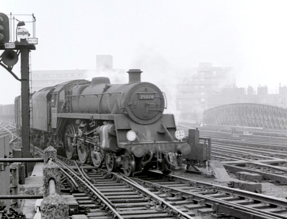 75078 at Waterloo with van train